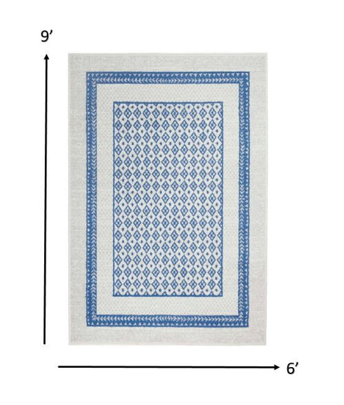 Ivory and Blue Geometric Area Rug
